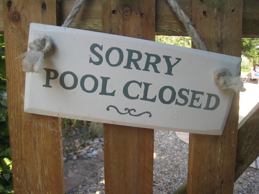 pool-closed sign on door