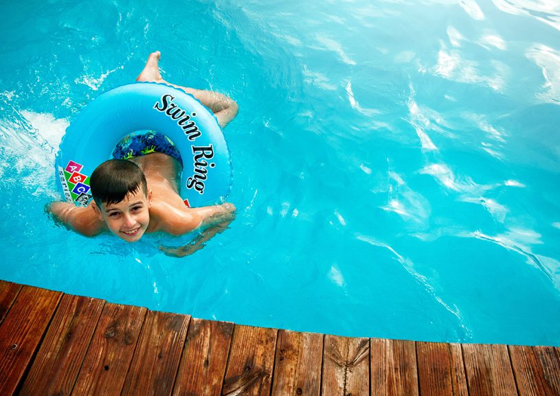Boy Swim Safely in Pool